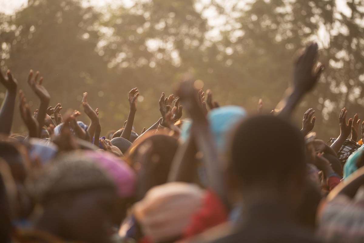 hands people dancing during daytime crowd