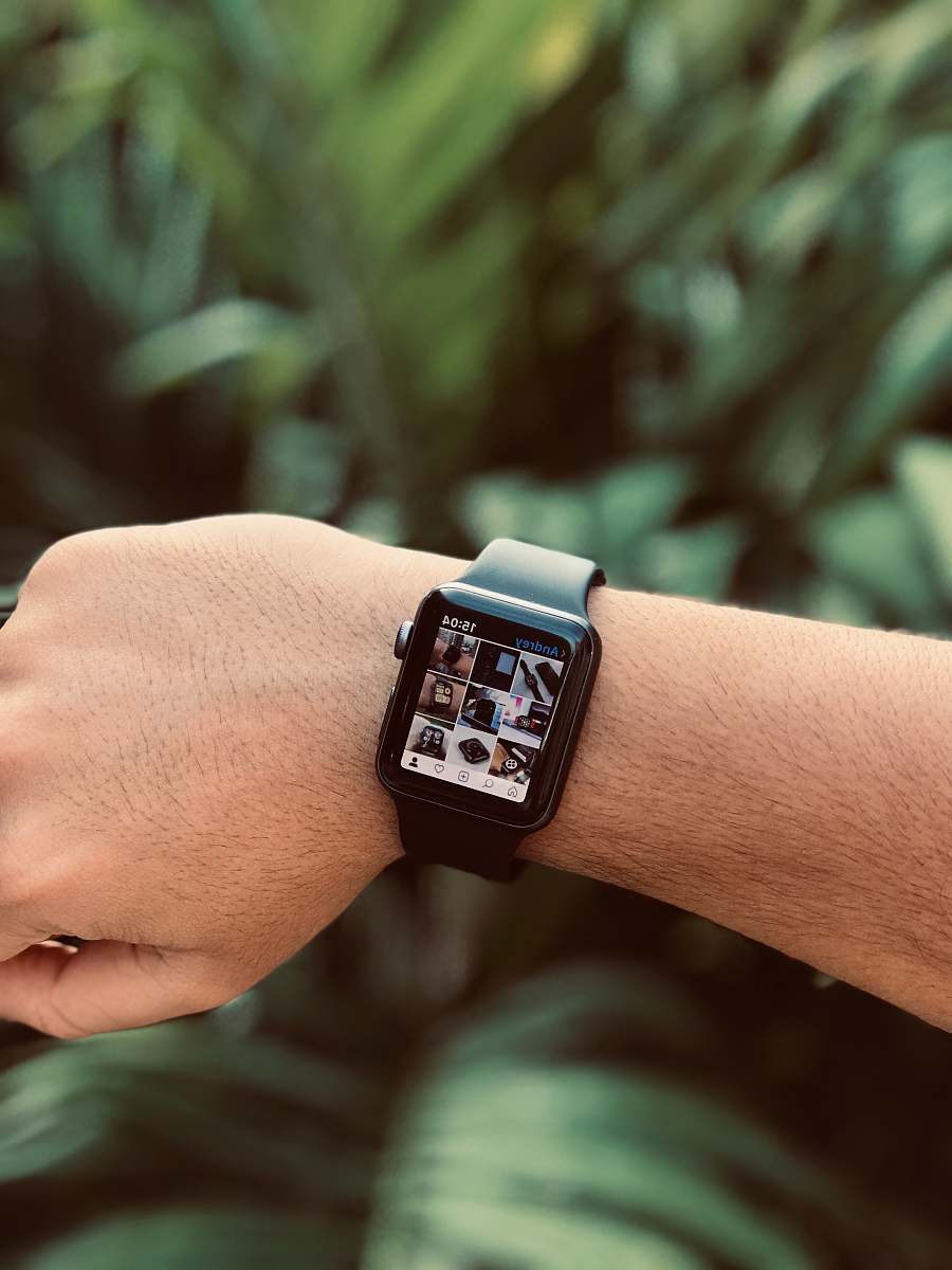 human black Apple Watch wristwatch