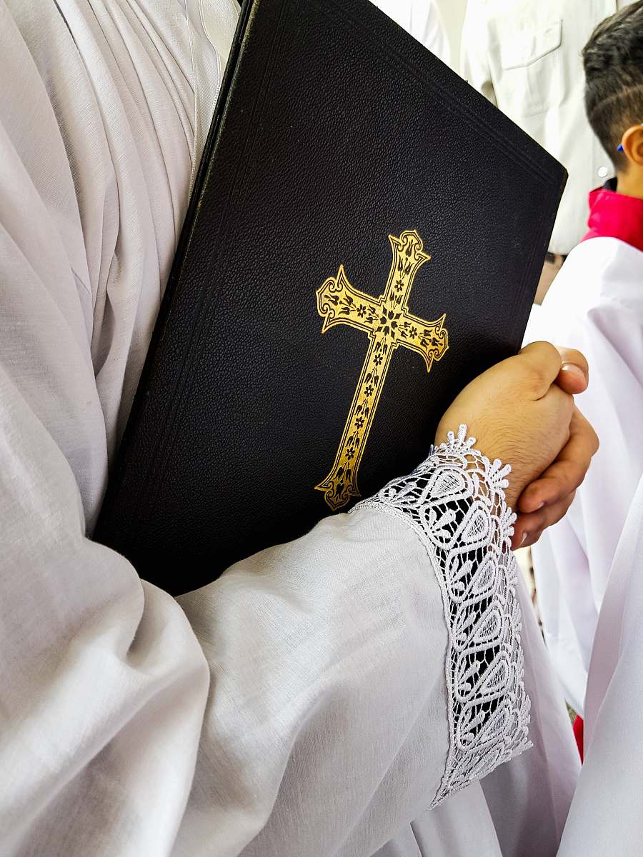 human Holy Bible priest