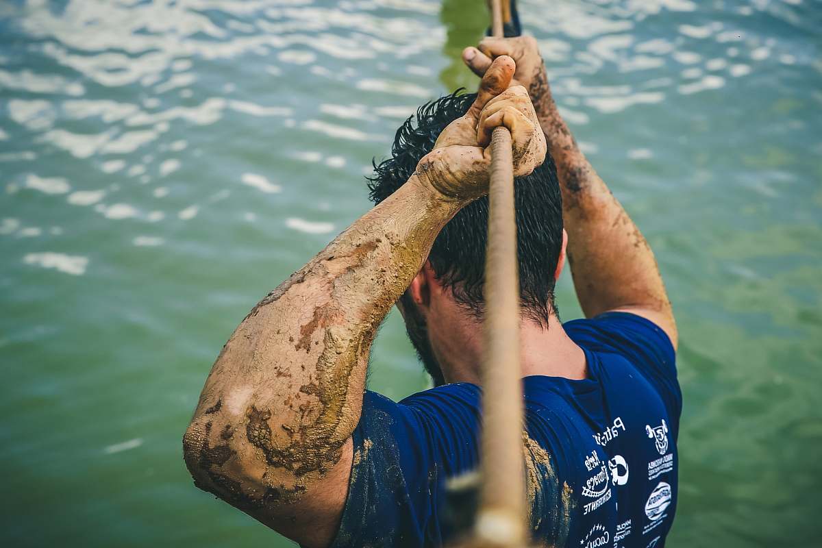 male man moving across rope bridge miguel pereira