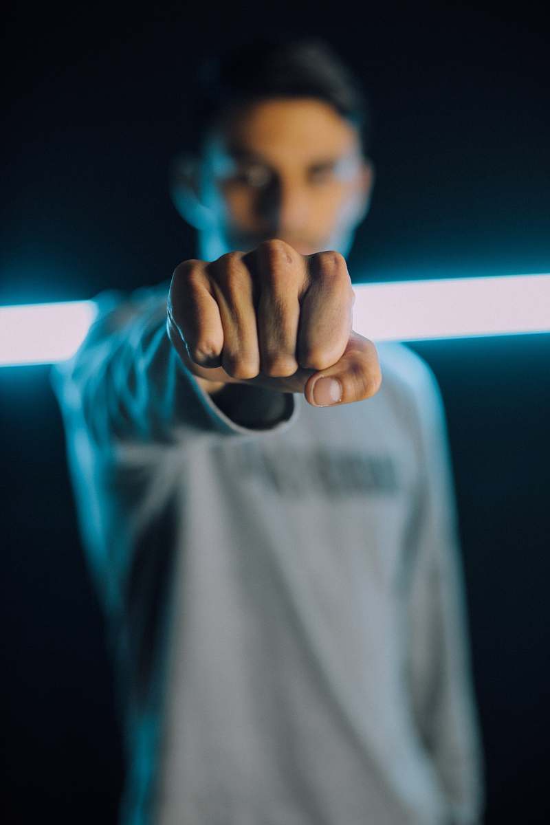 human man showing his fist hand