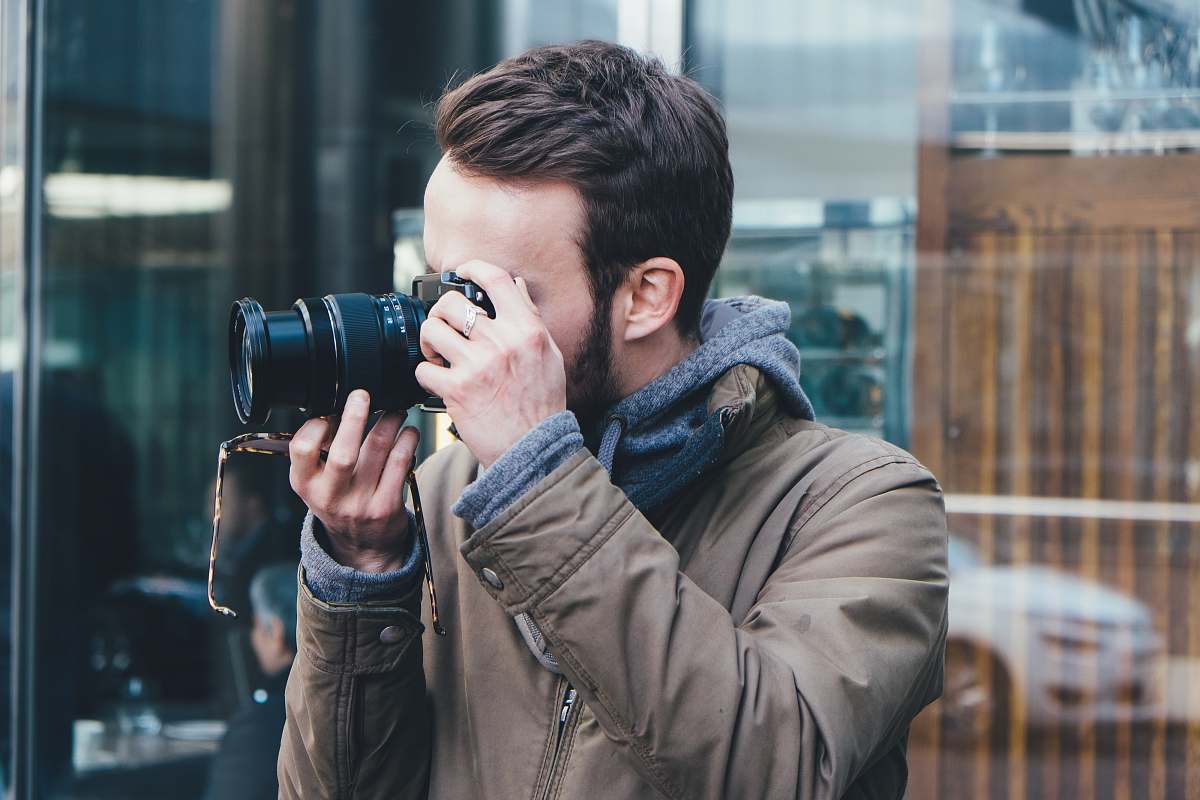 human man taking picture photographer