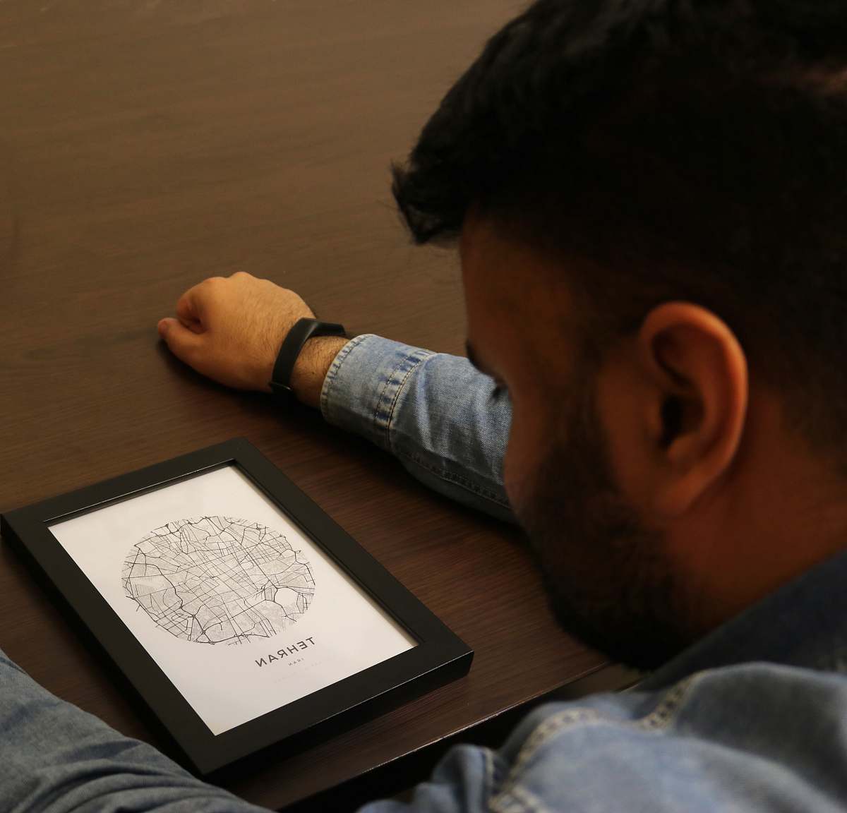 human man wearing denim jacket wood