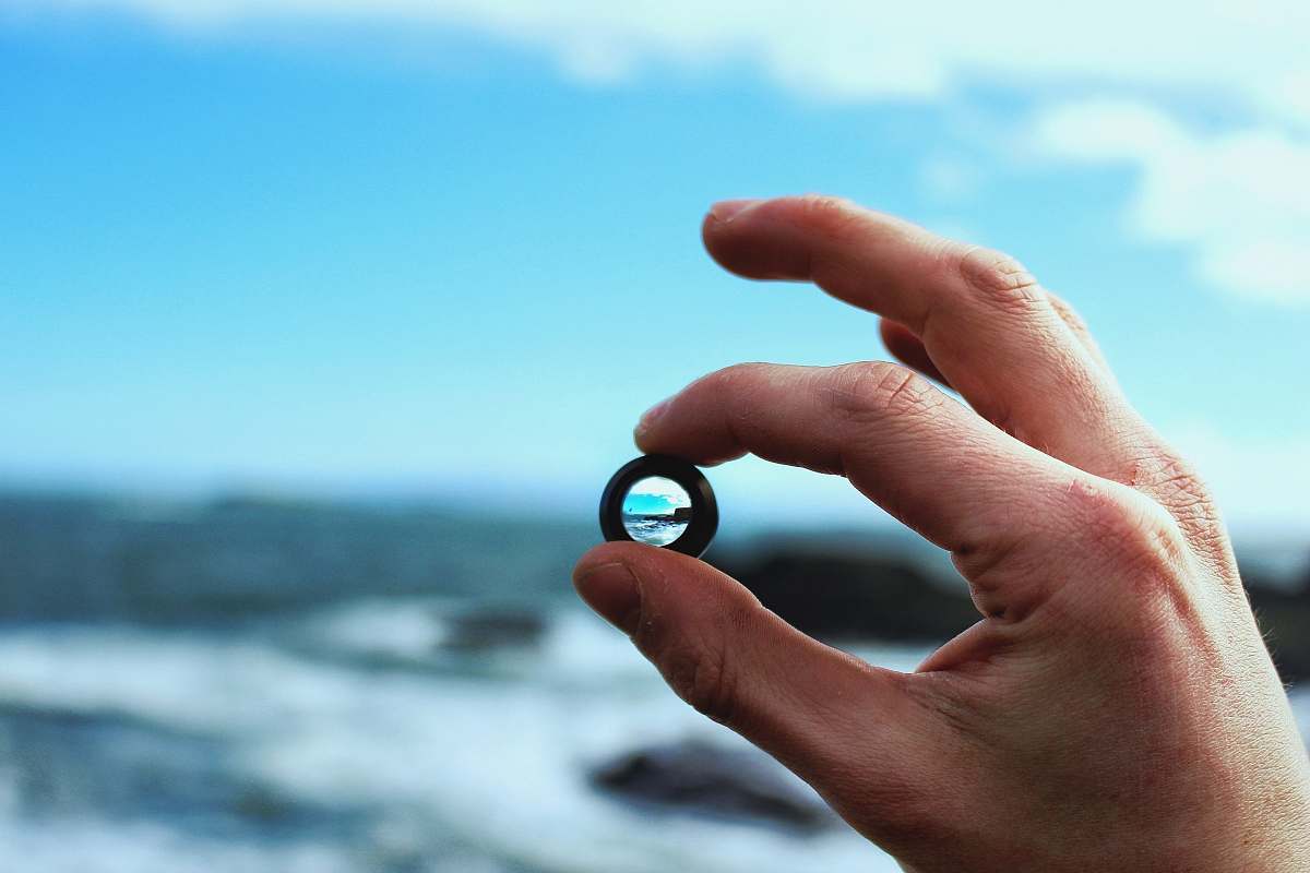 human person holding black ring people
