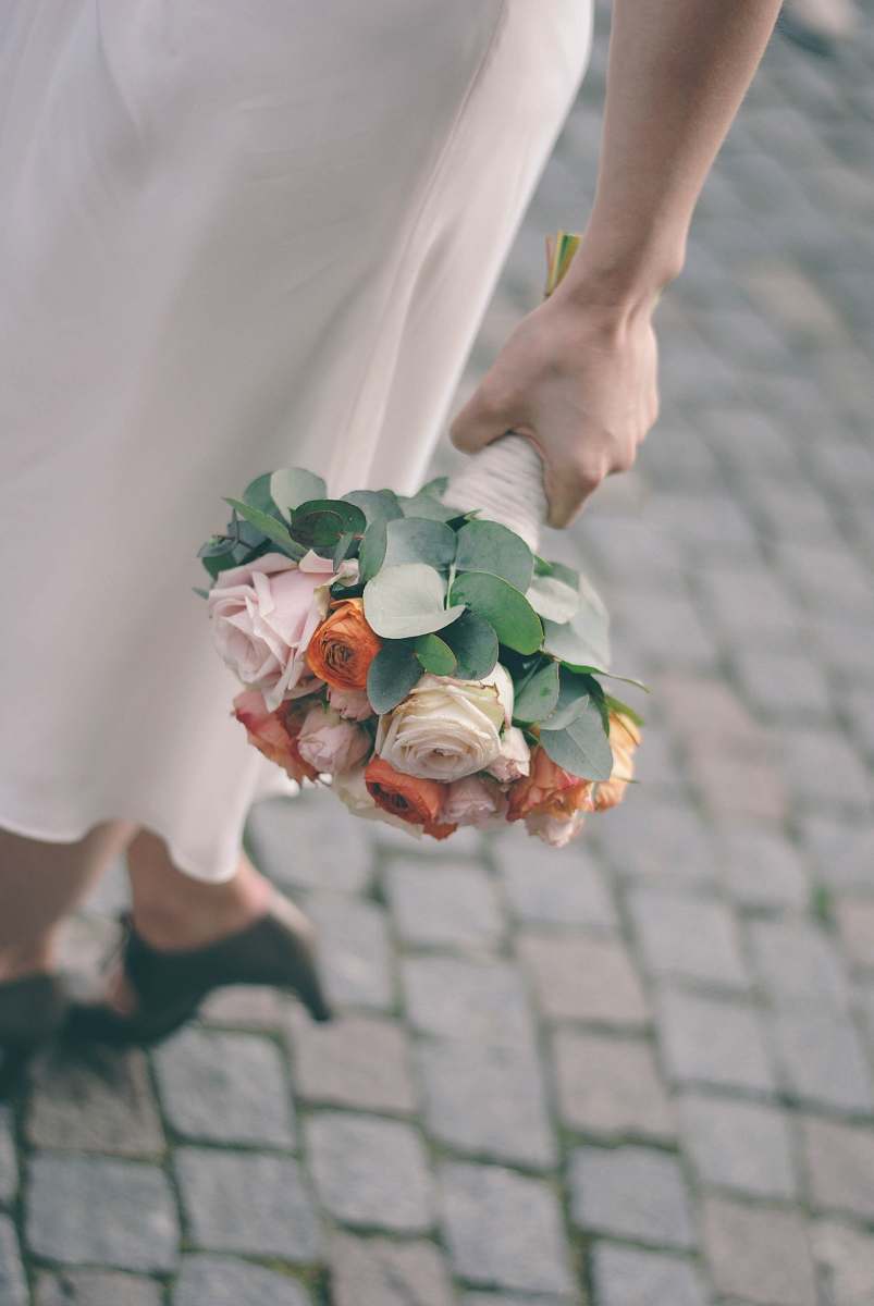 flower person holding flower arrangement rose