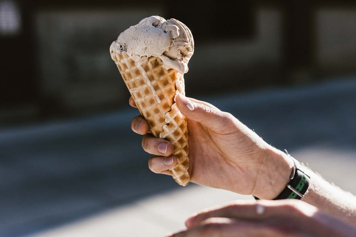 human person holding icecream ice cream
