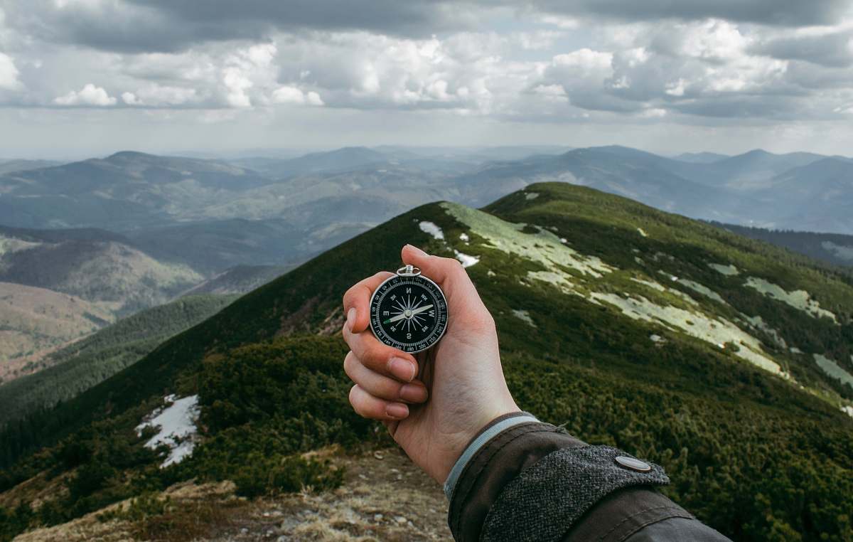 Human Person Holding Silver Compass People Image Free Photo