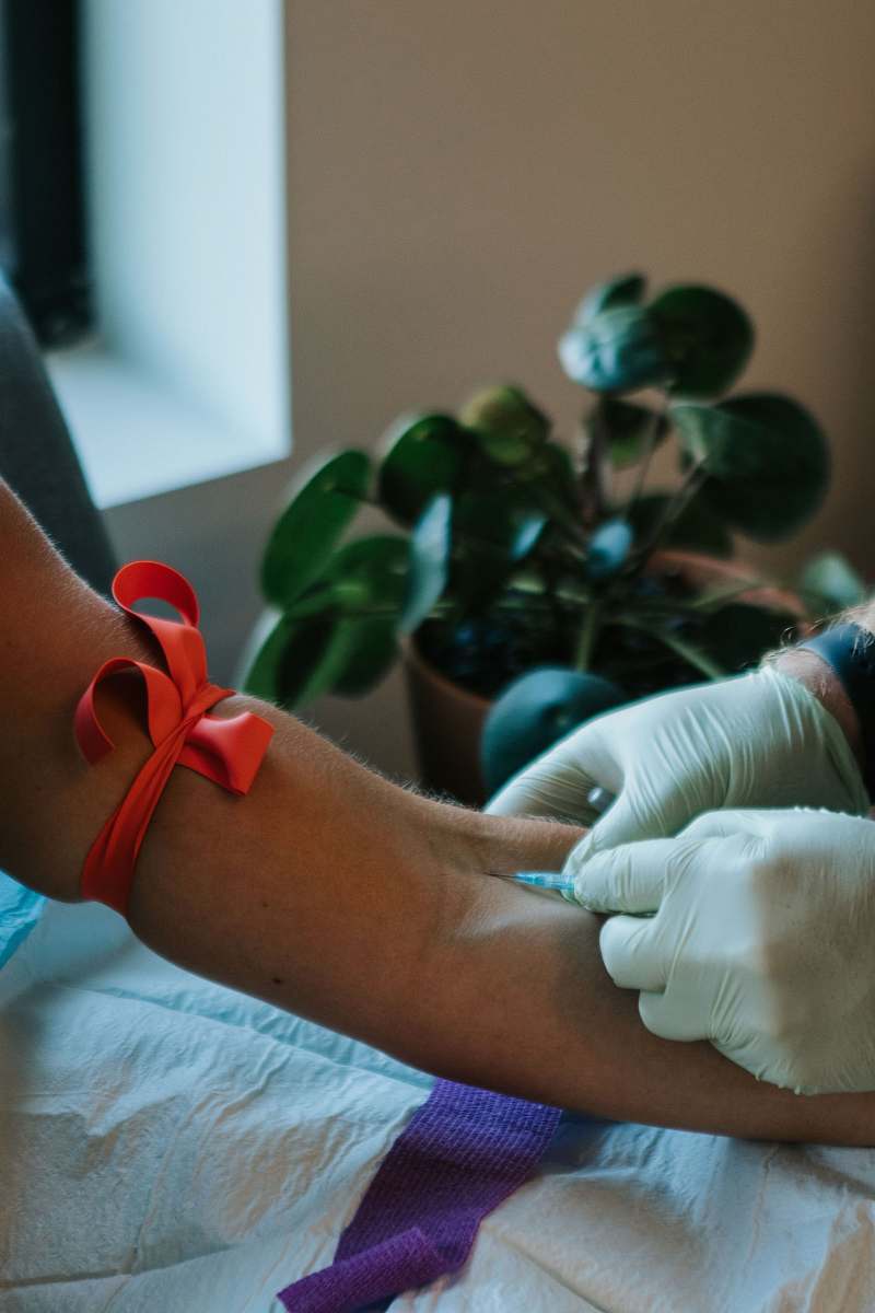 human person injecting syringe arm