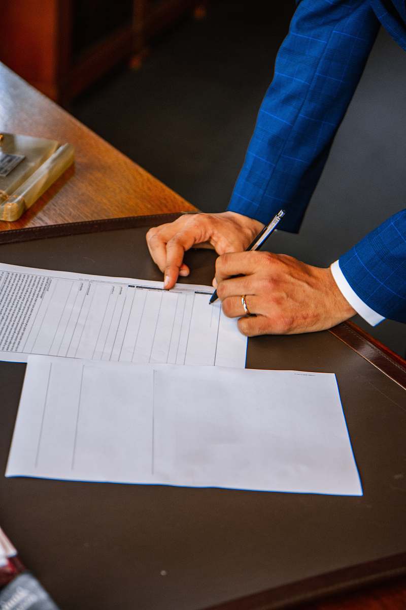 human person writing on white form paper text