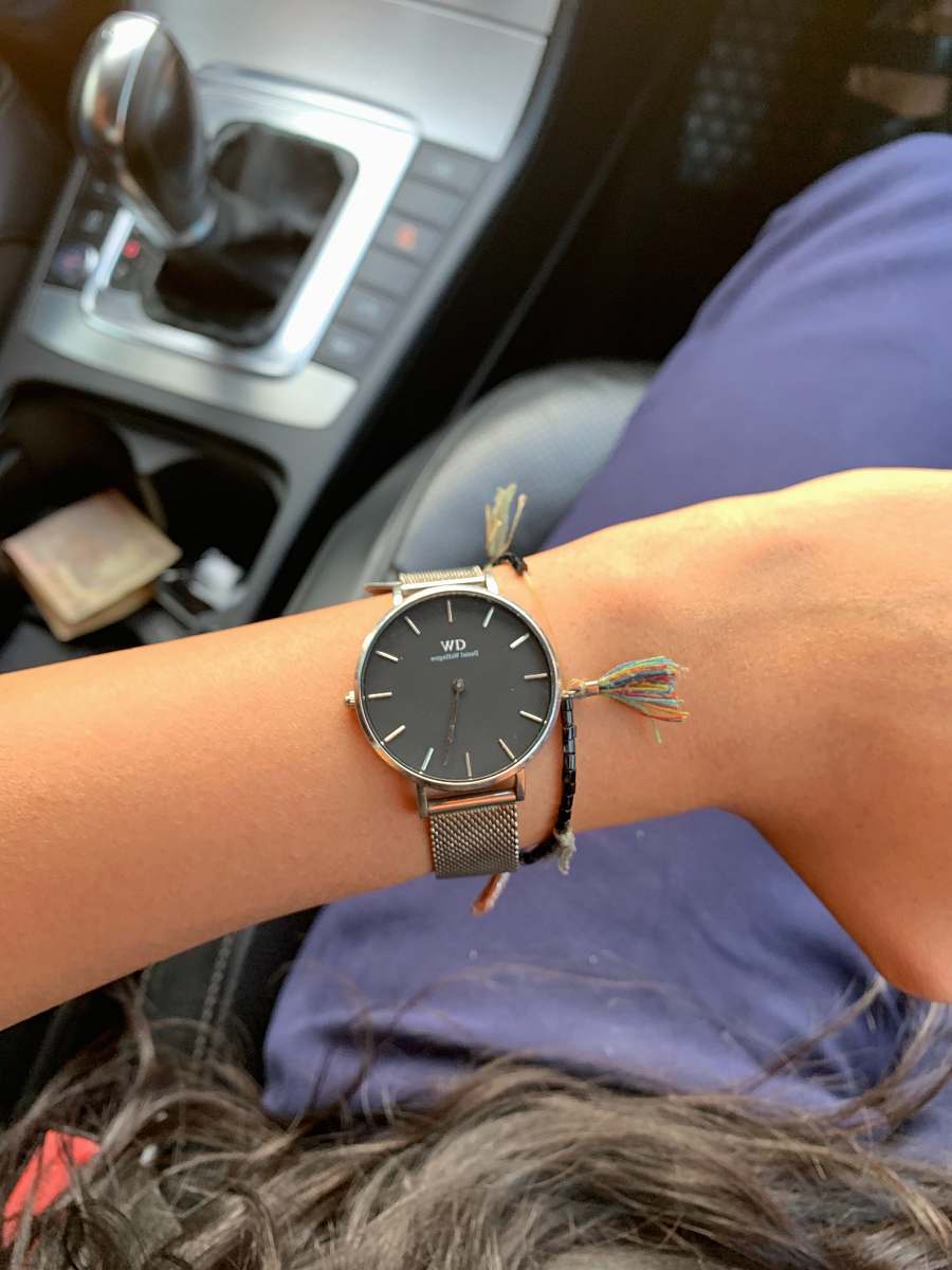 human round silver-colored analog watch reading 5:22 am wristwatch
