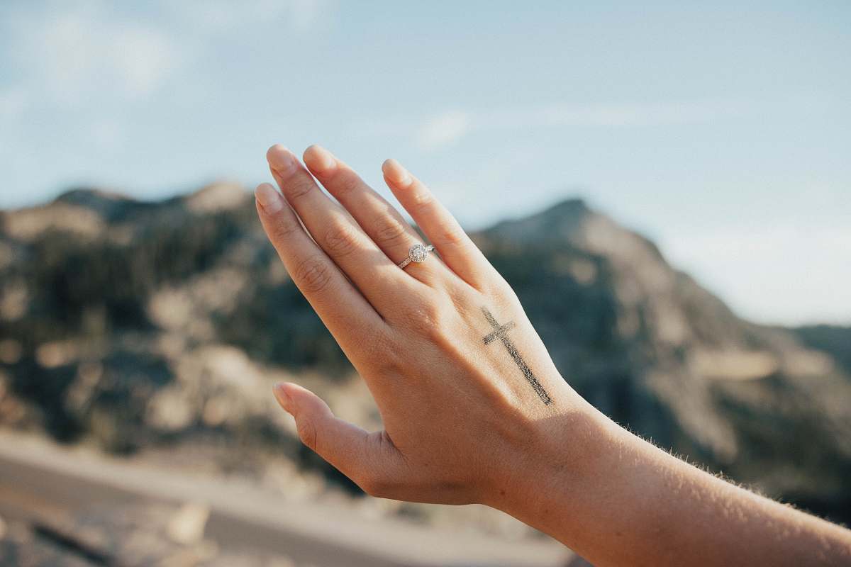 human silver-colored ring finger