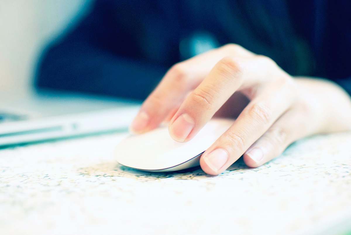 human white Apple Magic mouse hand
