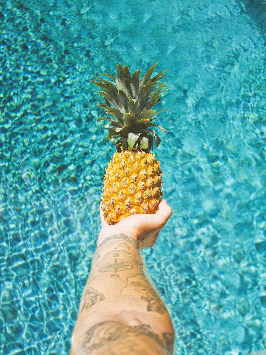 fruit person holding pineapple fruit indonesia