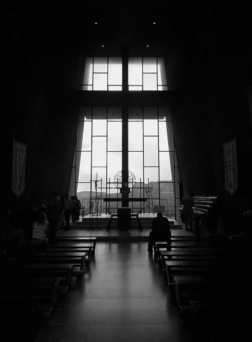  photo of window panel with chairs 