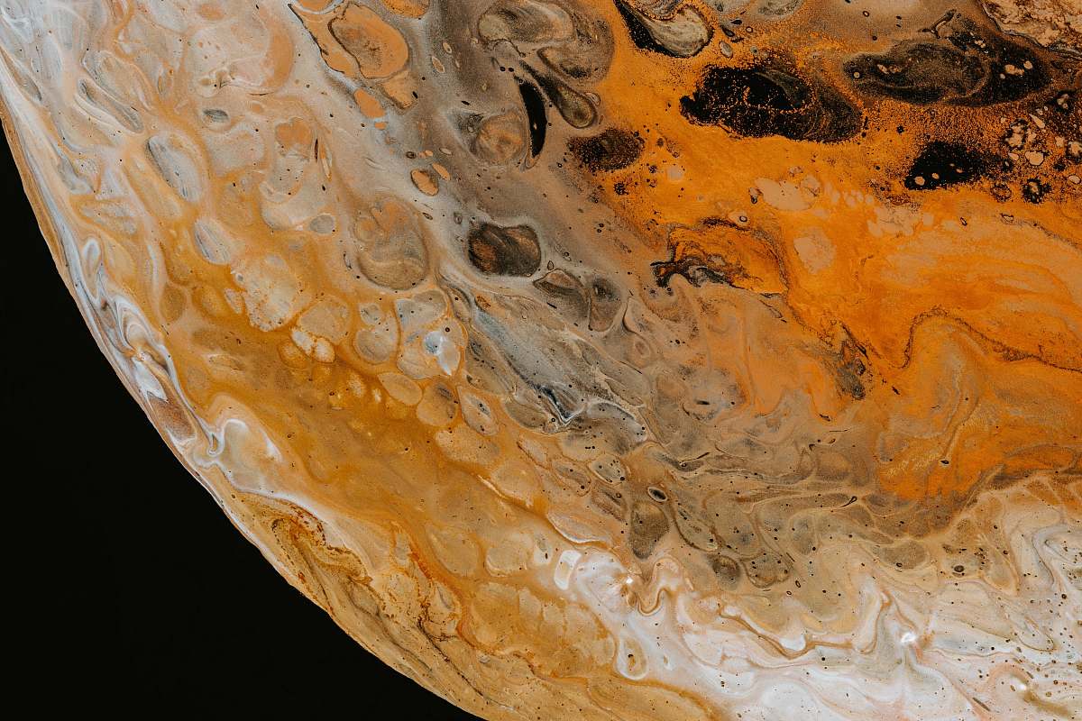 ornament closeup photography of planet accessory