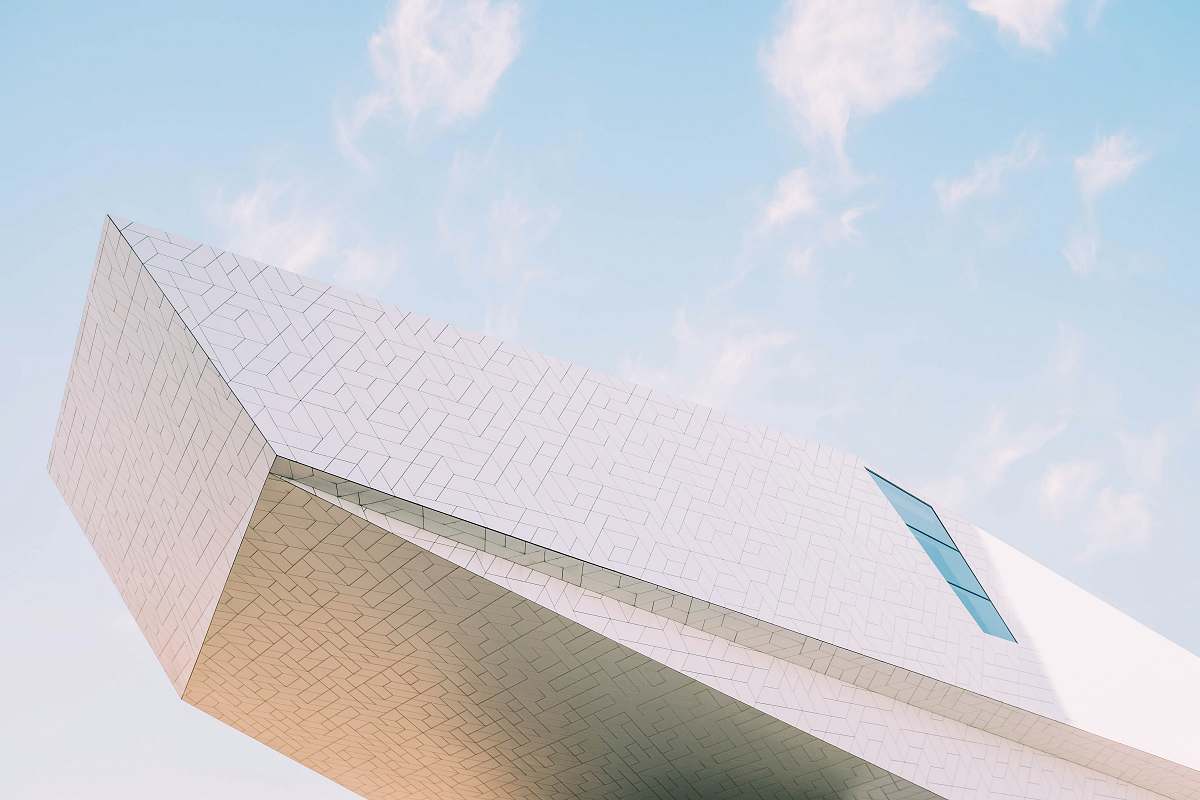 building low-angle photography of pointed building city