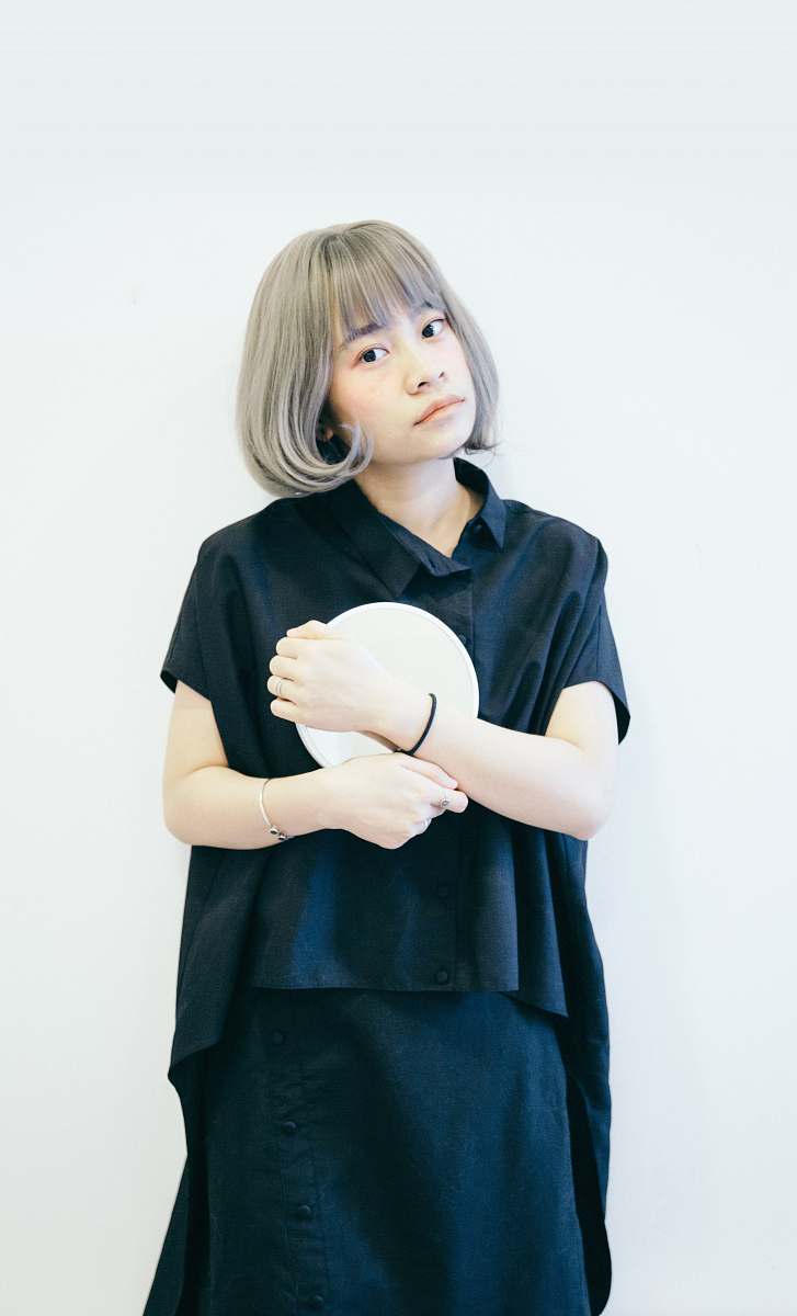 clothing woman in black button-up T-shirt sleeve