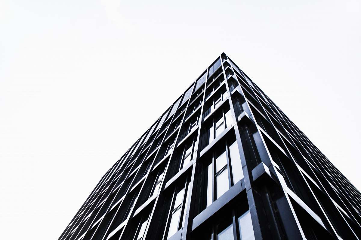 building black concrete building during daytime urban