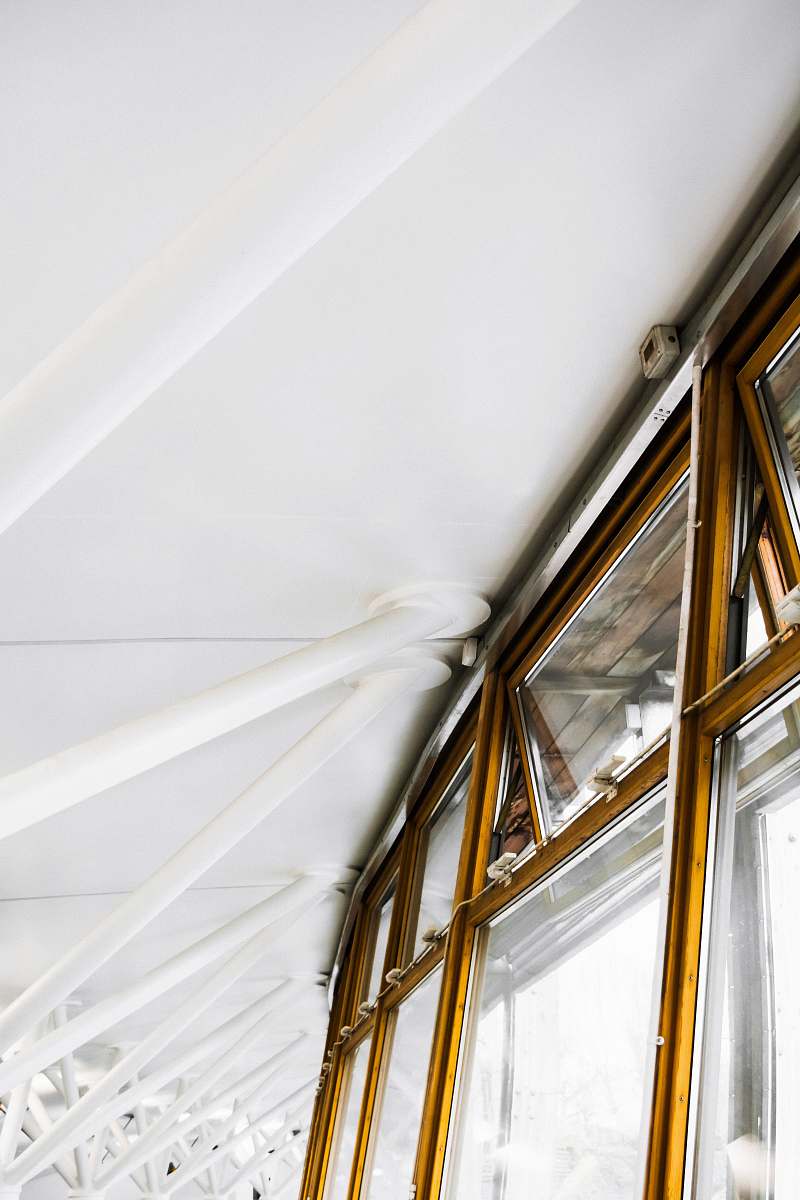 building brown wooden framed glass window window
