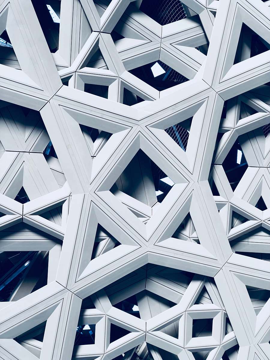 triangle closeup photo of white decor building
