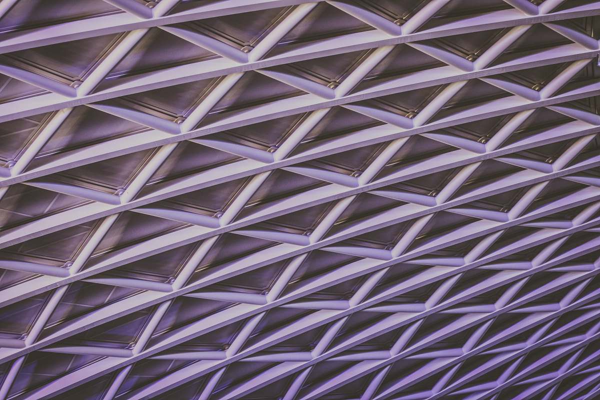 london Latticework of support beams in a ceiling pattern