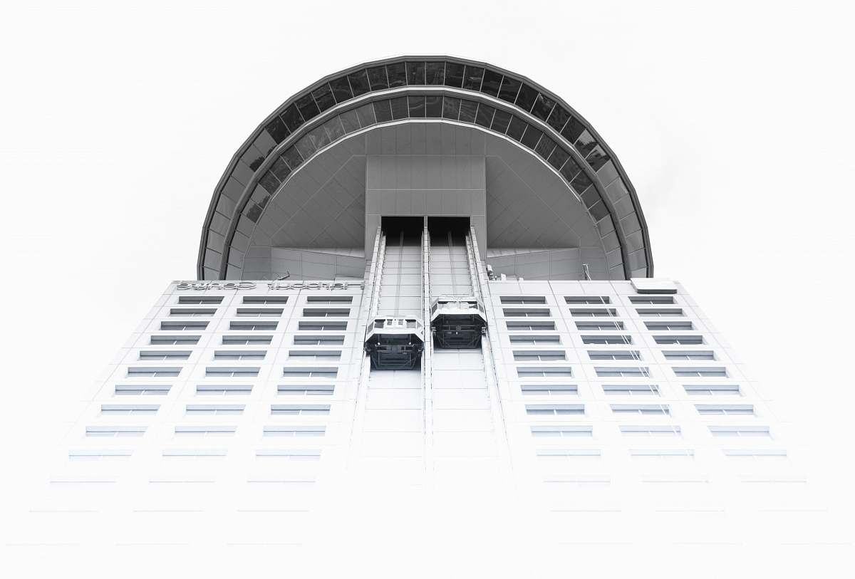building low angle photography of white and gray high rise building at daytime vancouver