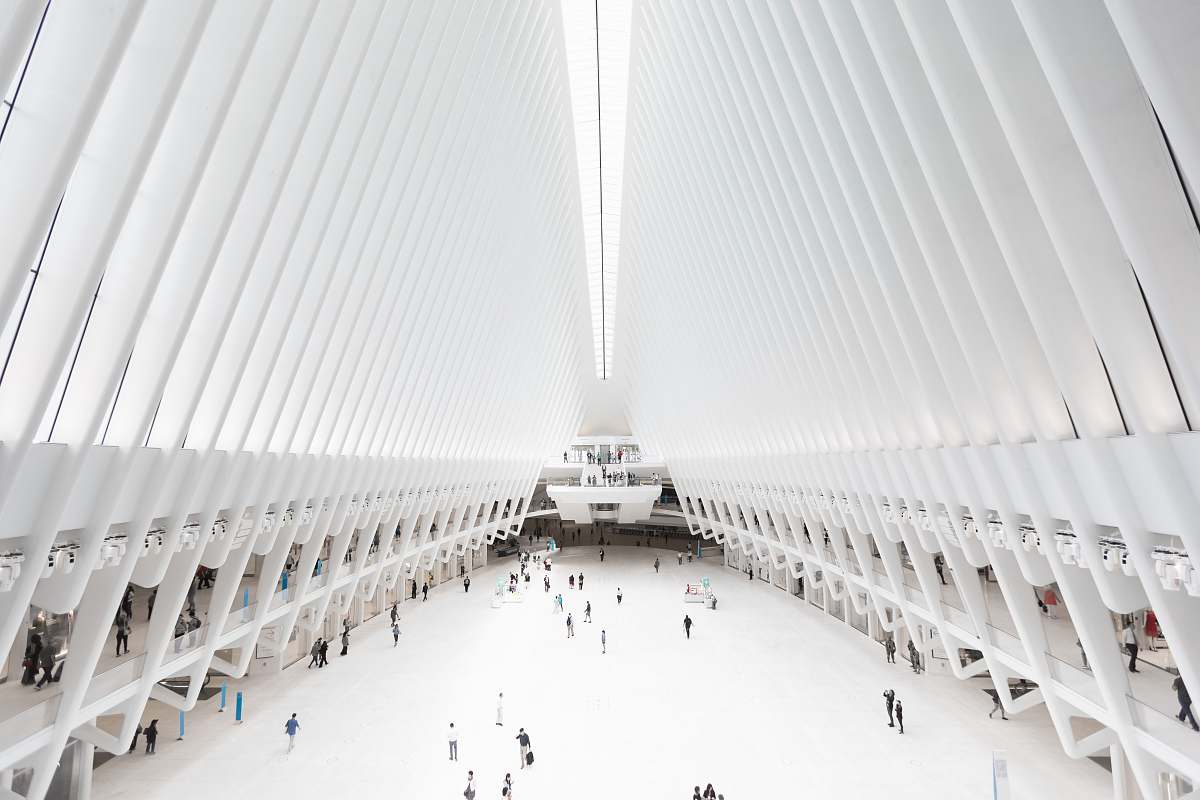 grey people gathering inside building the oculus