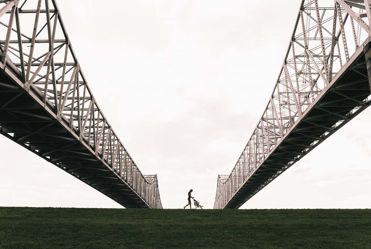 bridge person with stroller passing through bridges illustration new orleans