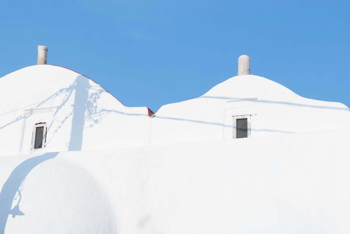 building photo of a white concrete building blue