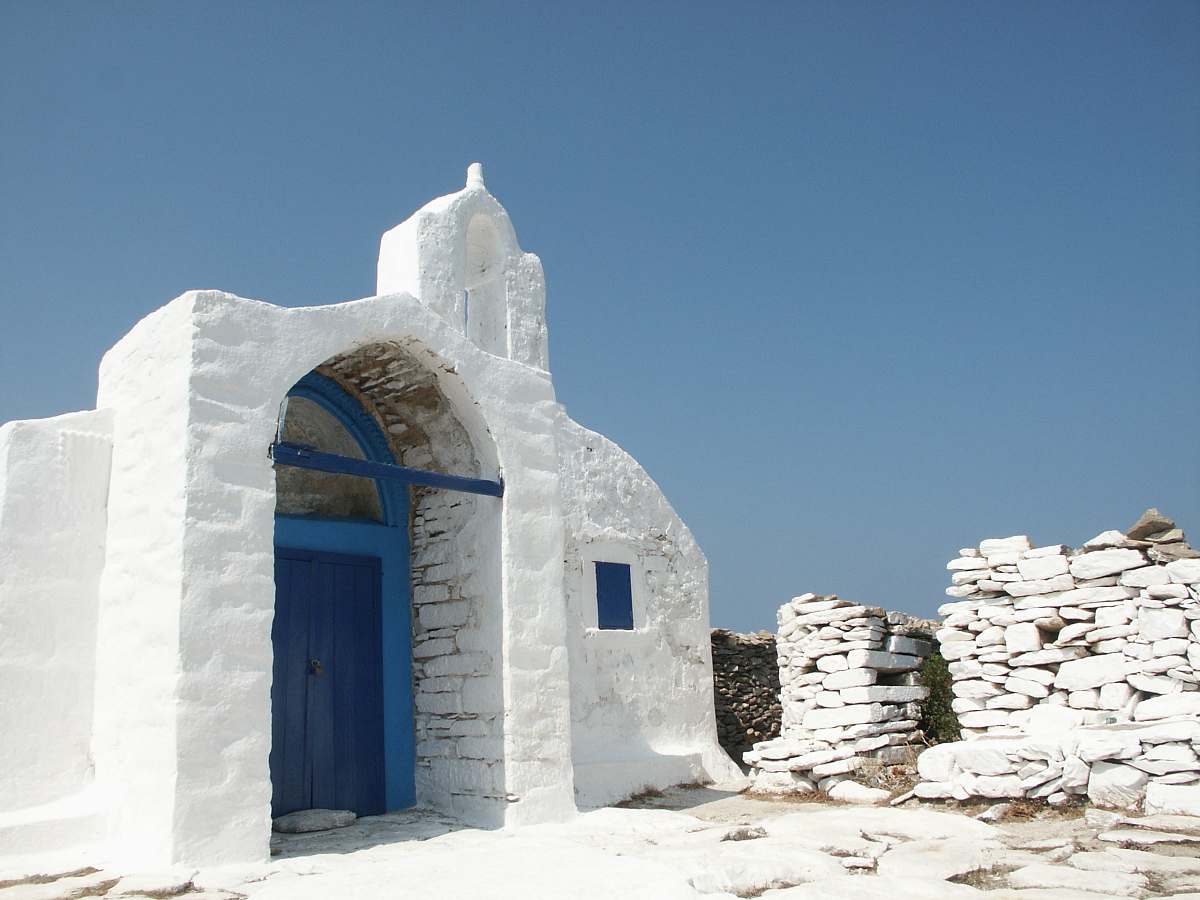 building white concrete house under blue sky amorgos