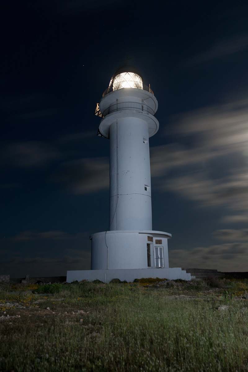 building white tower house turned on lighthouse