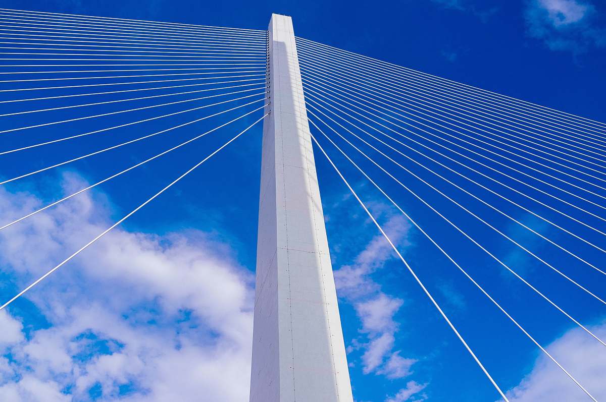 clouds worm's-eye view photography of white tower blue sky