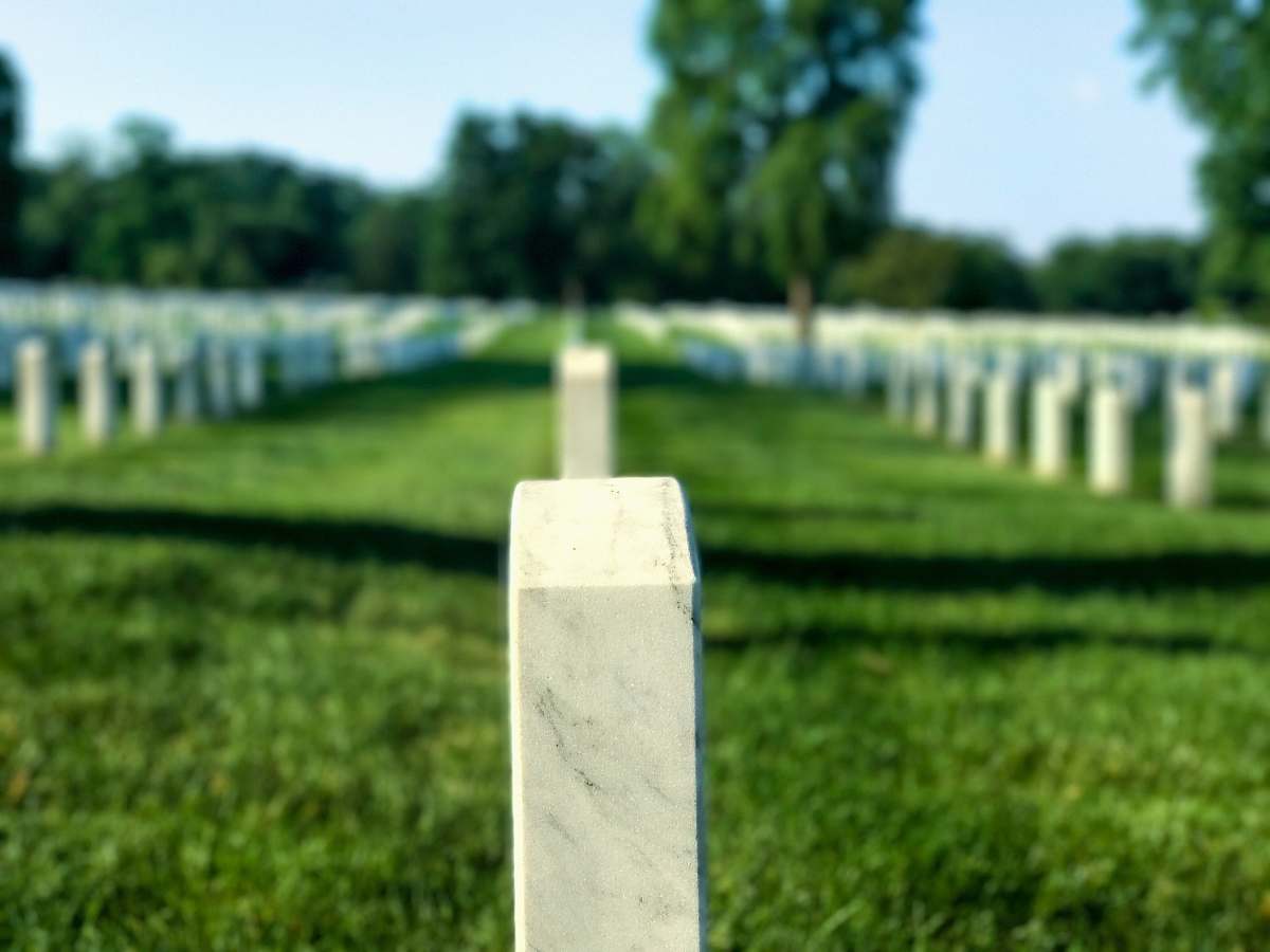 tomb white tombstone in cemetery tombstone