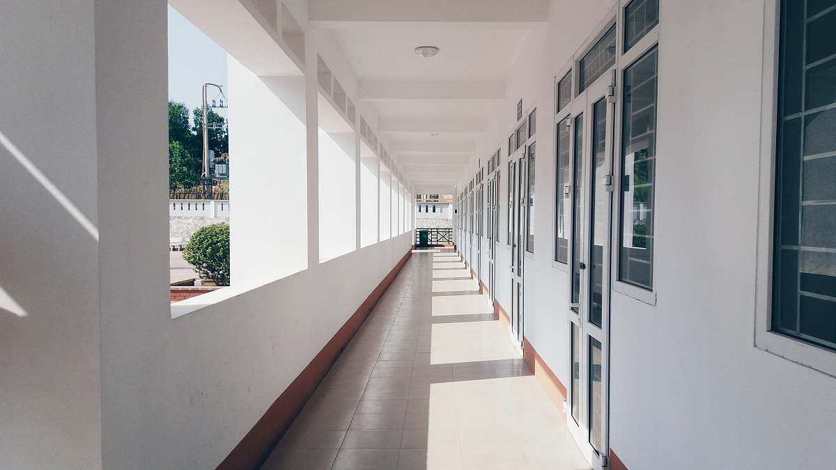 corridor empty building hallway apartments