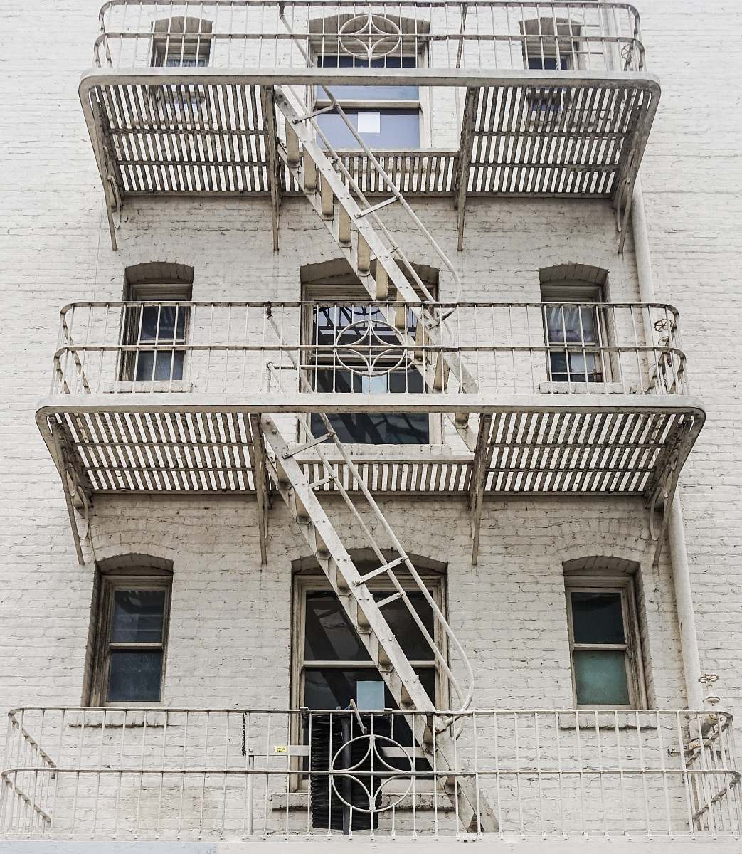 handrail brown concrete building railing