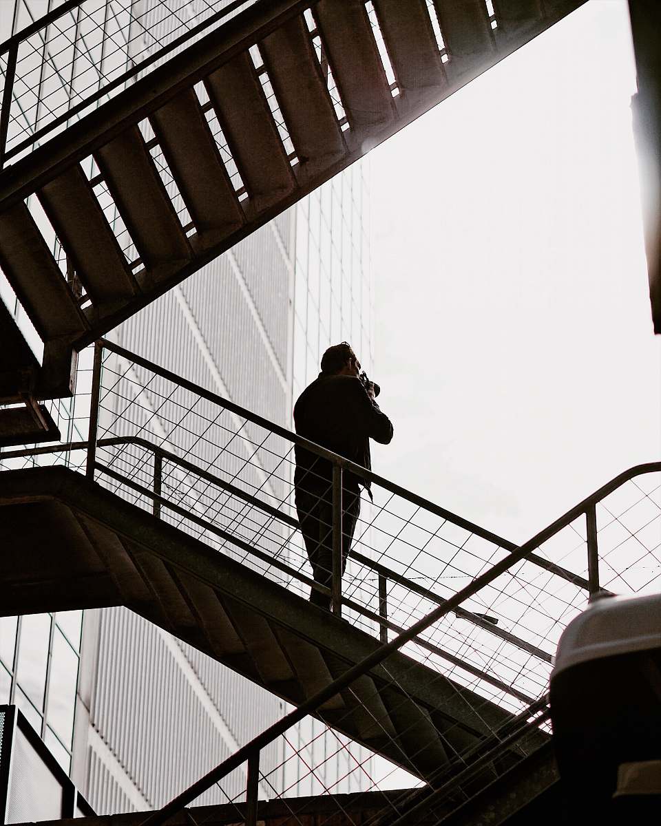 handrail man on stairs railing