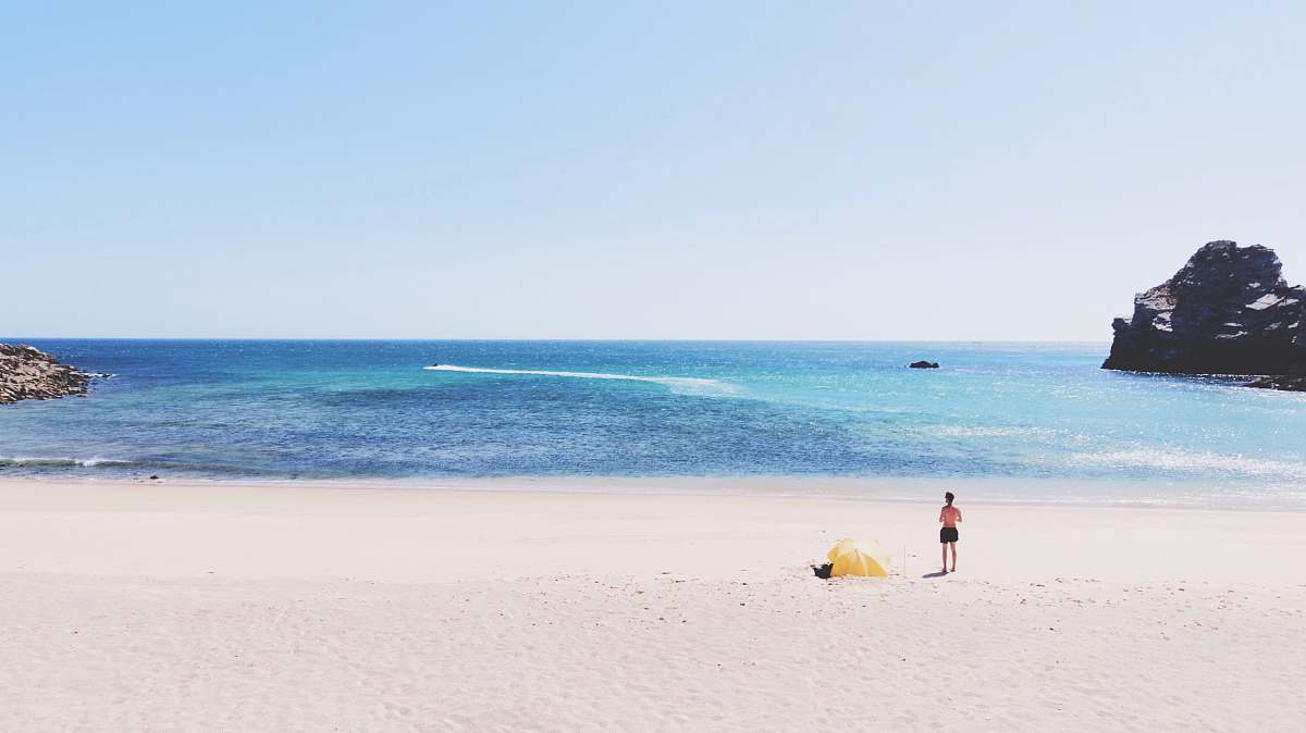 coast topless person at beach ocean