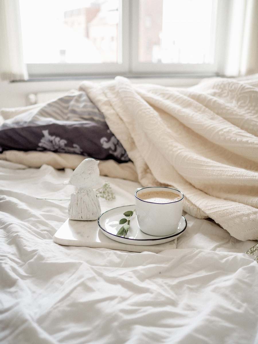home teacup filled with liquid placed on saucer furniture