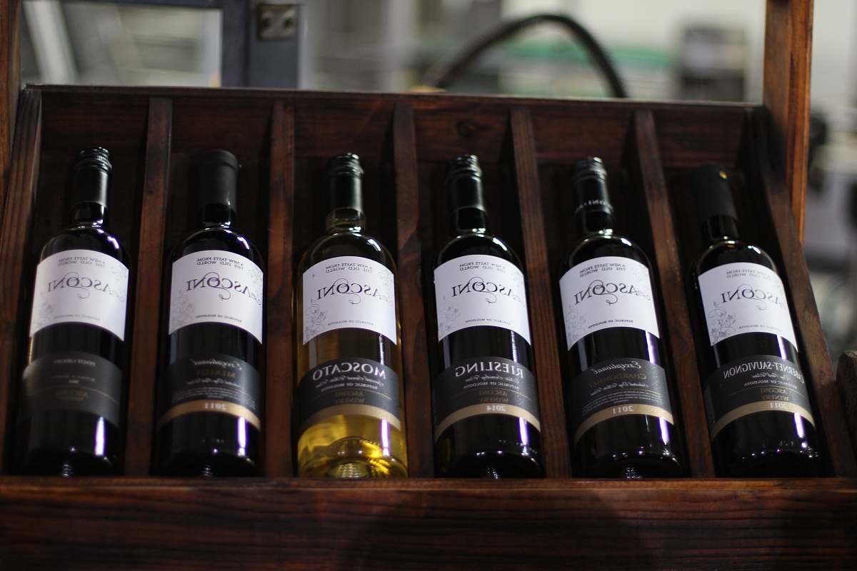 wine several labeled bottles on rack moldova