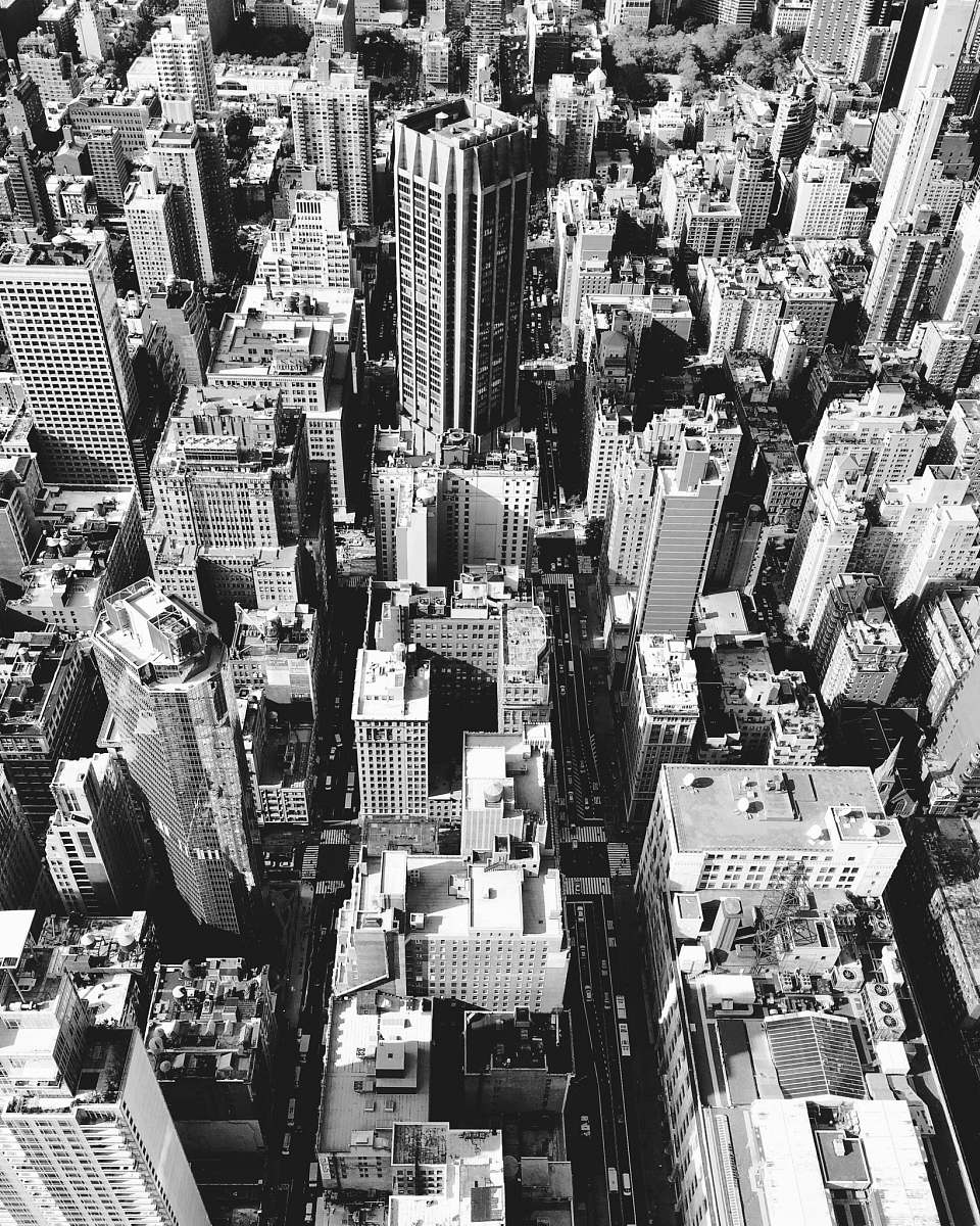 city aerial grayscale photography of buildings aerial view
