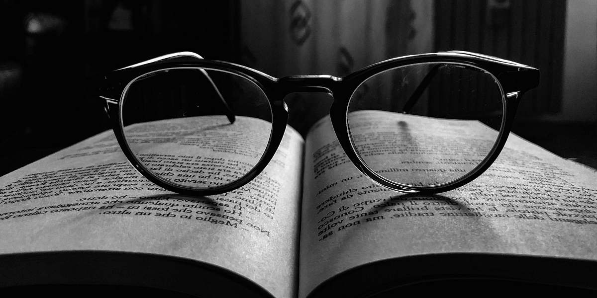 glasses black frame eyeglasses on book accessories