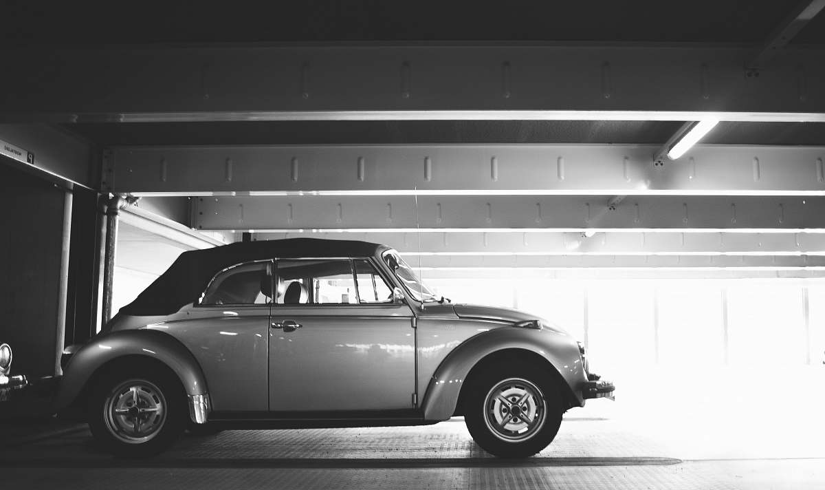 automobile classic Volkswagen Beetle Cabriolet parked in parking lot car