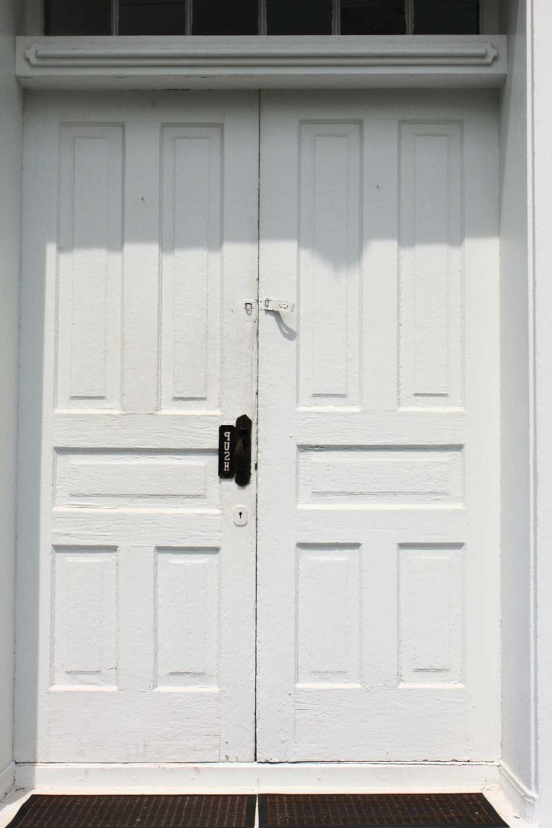 grey closed white wooden door door