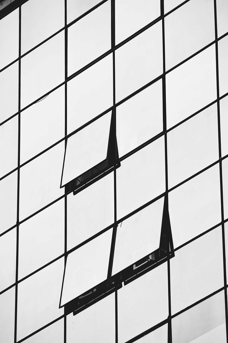 white closeup photo of building utility pole
