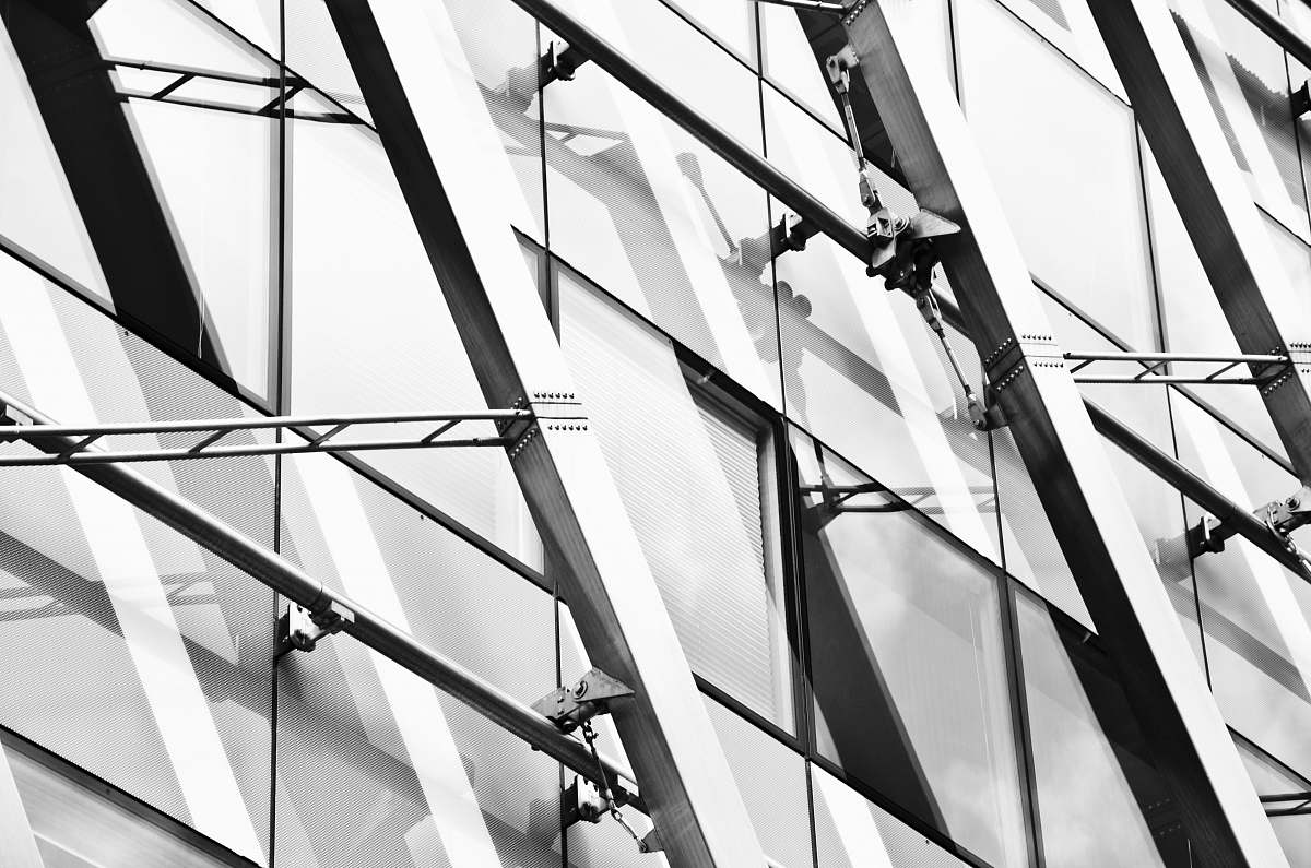 architecture closeup photography of glass window building window