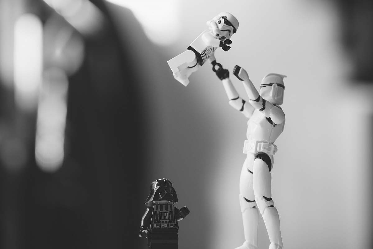 grey focused photo of a Star Wars character toy