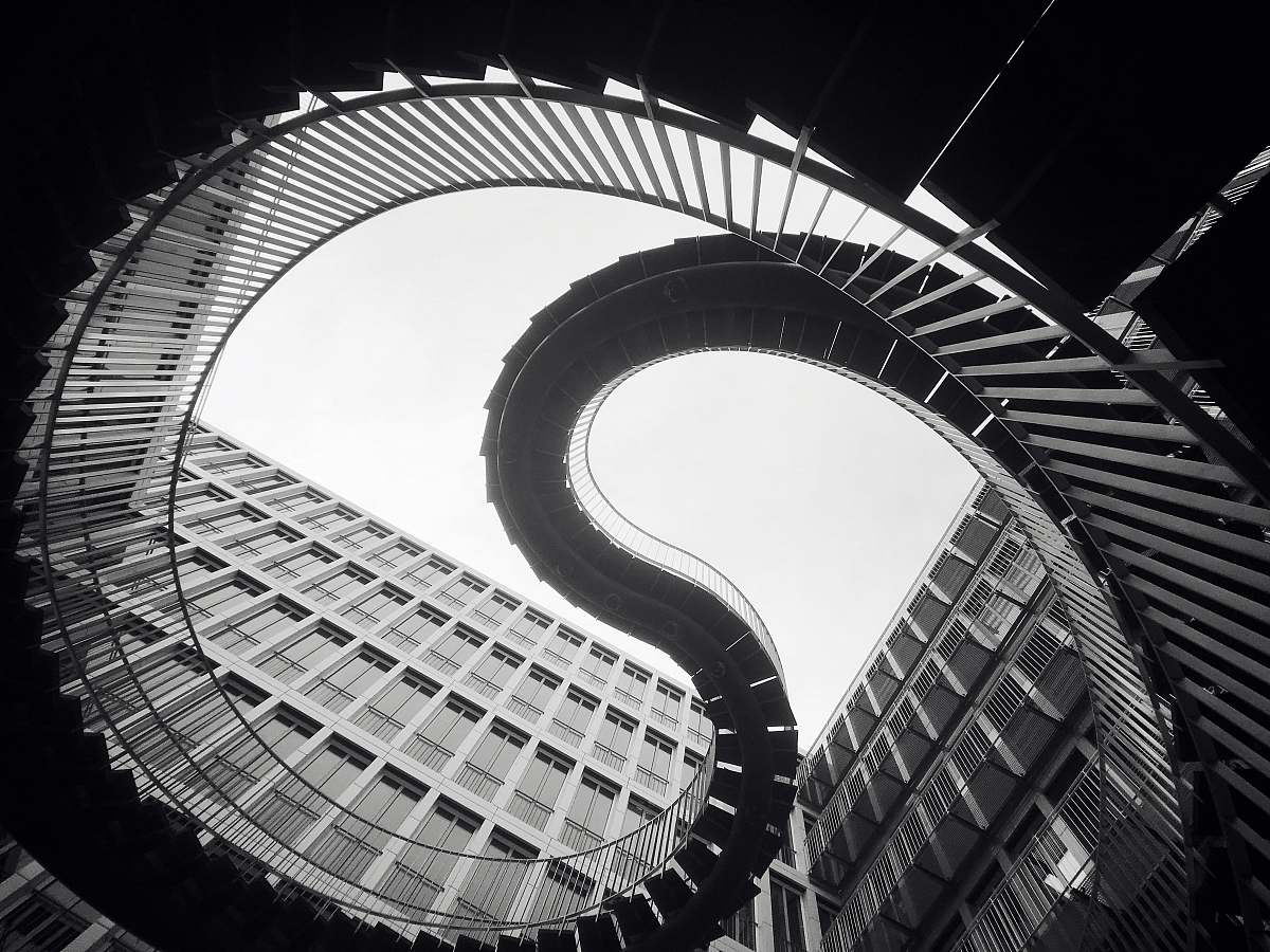 spiral grascale photo of spiral stairs kpmg