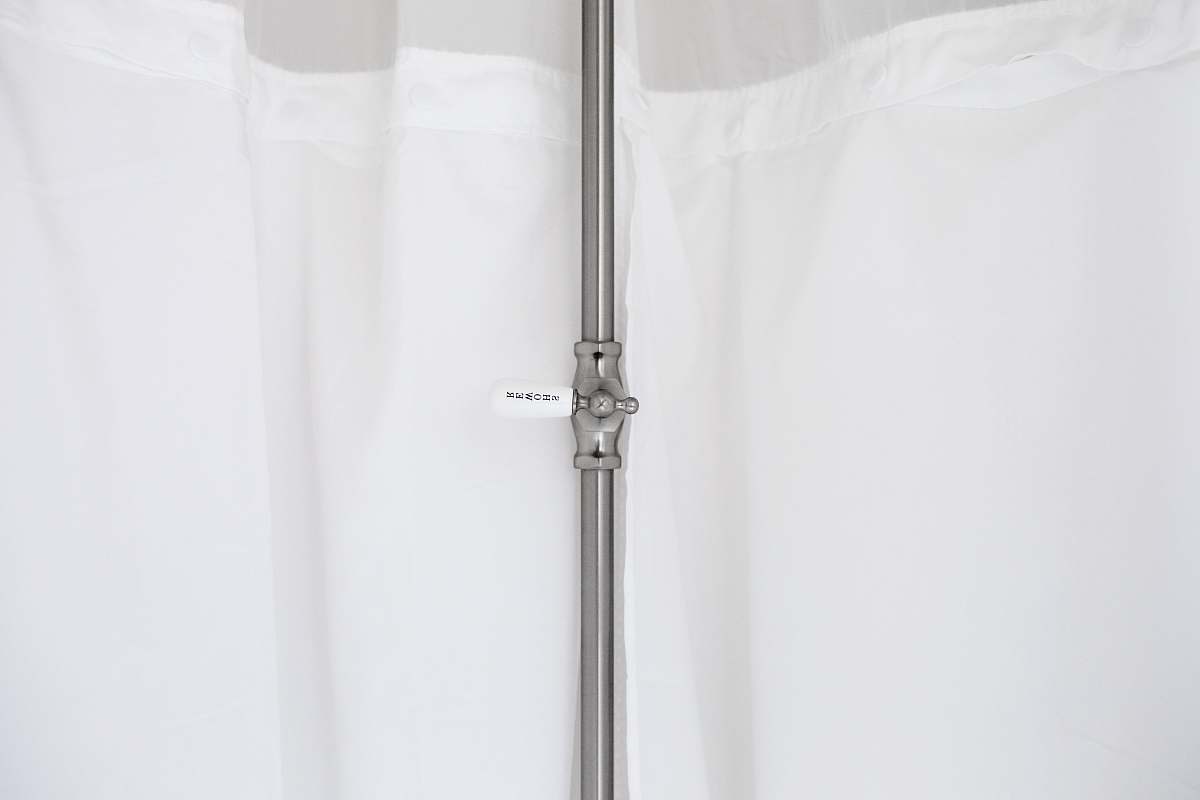 grey gray metal pole beside white curtain indoors