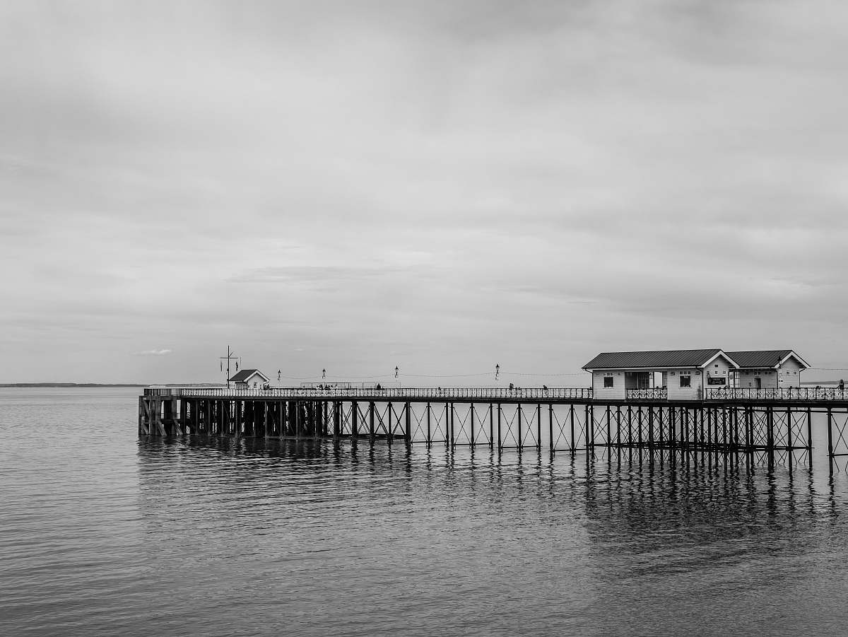water gray wooden dock pier