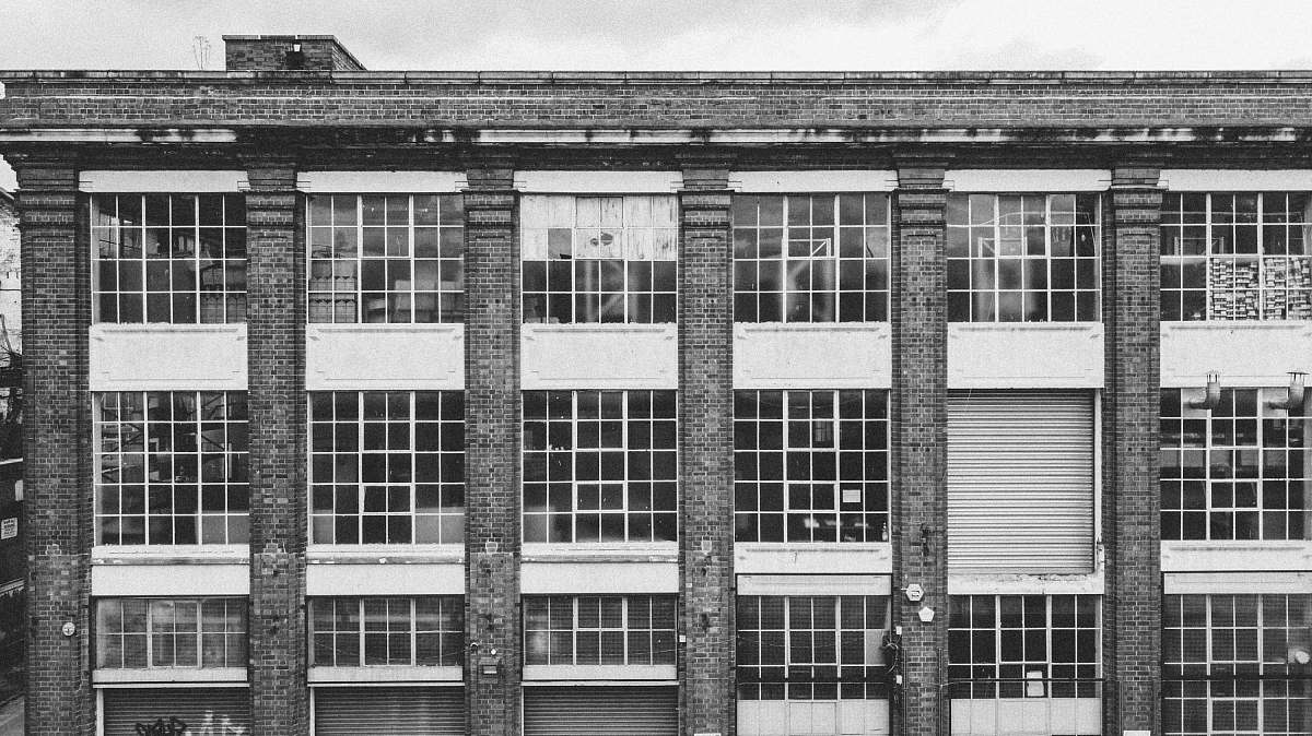 grey grayscale architectural photography of building leicester